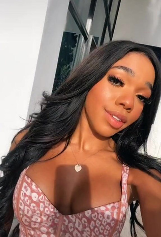 Hottie Teala Dunn Shows Cleavage in Leopard Crop Top