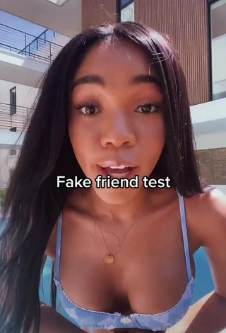 4. Sexy Teala Dunn Shows Cleavage in Floral Bikini at the Swimming Pool