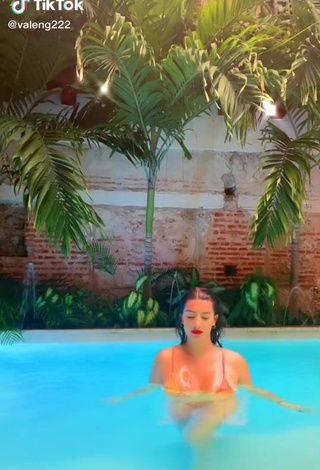 1. Sexy Valentina Gómez Shows Cleavage in Orange Bikini at the Swimming Pool