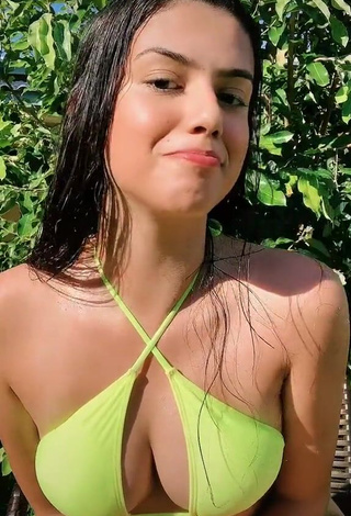 3. Dazzling Victtoria Medeiros Shows Cleavage in Inviting Yellow Bikini Top