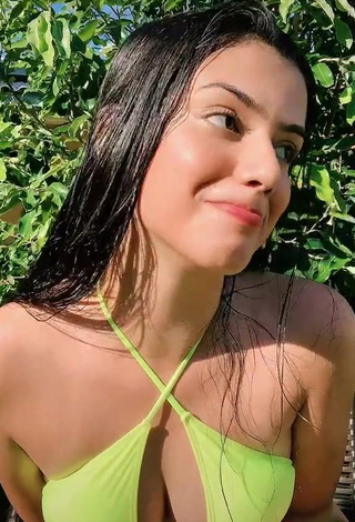 4. Dazzling Victtoria Medeiros Shows Cleavage in Inviting Yellow Bikini Top