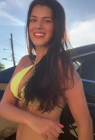 1. Hottie Victtoria Medeiros Shows Cleavage in Yellow Bikini