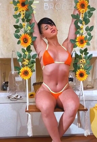 3. Sexy Yanne in Orange Bikini