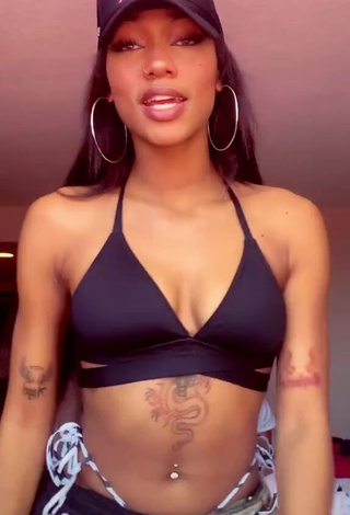 Beautiful Bria Alana Shows Cleavage in Sexy Black Bikini Top