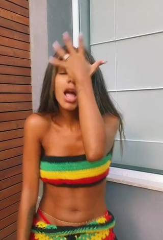 3. Sexy Brunna Gonçalves in Striped Bikini Top