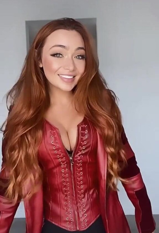 1. Hot Caitlin Christine Shows Cleavage in Red Corset