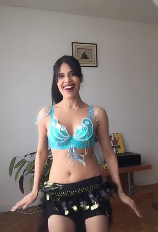 1. Sexy XENA in Turquoise Bikini Top while doing Belly Dance