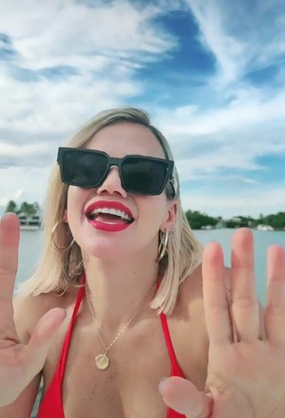 Sexy Fanny Lu Shows Cleavage in Red Bikini Top on a Boat