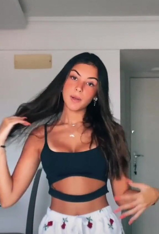 Desirable Gabriela Moura Shows Cleavage in Black Crop Top