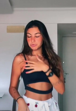 3. Desirable Gabriela Moura Shows Cleavage in Black Crop Top