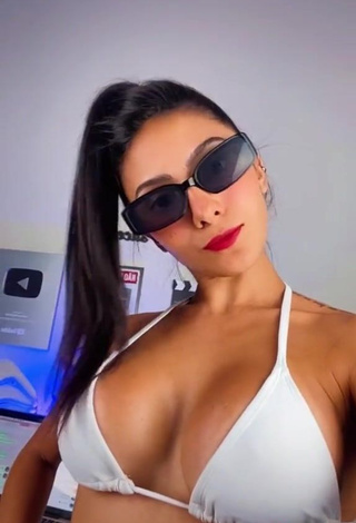 4. Erotic Isadora Nogueira Shows Cleavage in White Bikini Top