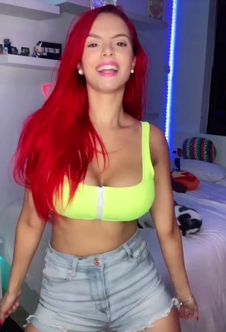 3. Sexy Jenny Devil Shows Cleavage in Lime Green Crop Top