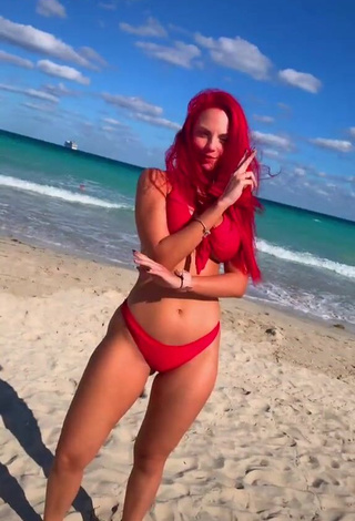 1. Sexy Jenny Devil Shows Cleavage in Red Bikini at the Beach