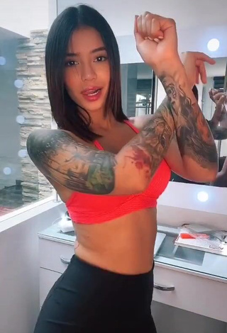 4. Hottest Jenn Muriel Shows Cleavage in Orange Sport Bra and Bouncing Boobs