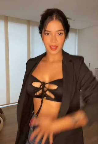 Hottie Jenn Muriel Shows Cleavage in Black Crop Top