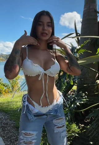 Sexy Jenn Muriel Shows Cleavage in White Bikini Top