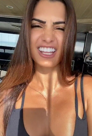 Hot Marina Ferrari Shows Cleavage in Black Sport Bra