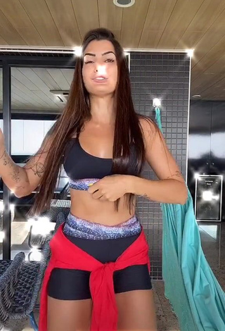 3. Sexy Marina Ferrari Shows Cleavage in Black Sport Bra