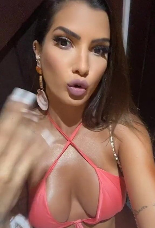 3. Hot Marina Ferrari Shows Cleavage in Peach Dress