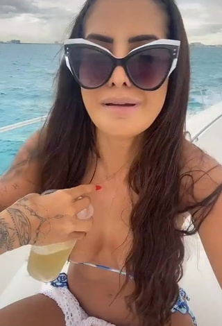 Sexy Marina Ferrari Shows Cleavage in Bikini on a Boat