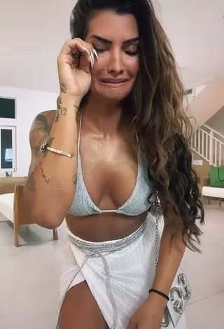 Alluring Marina Ferrari Shows Cleavage in Erotic Silver Bikini Top