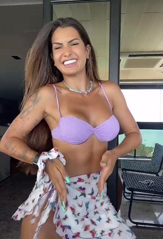 4. Hottest Marina Ferrari Shows Cleavage in Purple Bikini Top