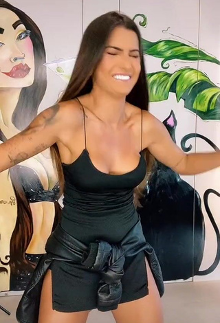 3. Sexy Marina Ferrari Shows Cleavage in Black Dress