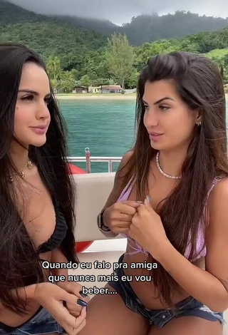 1. Pretty Marina Ferrari Shows Cleavage on a Boat