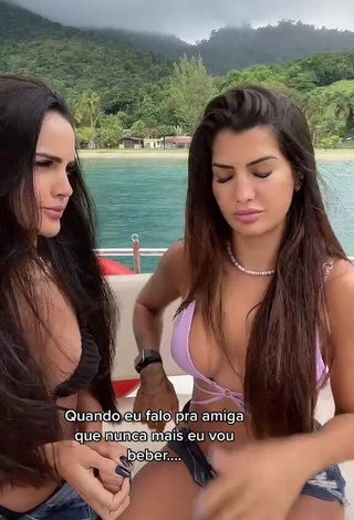 3. Pretty Marina Ferrari Shows Cleavage on a Boat