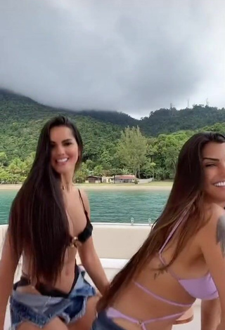 3. Amazing Marina Ferrari Shows Cleavage in Hot Bikini on a Boat