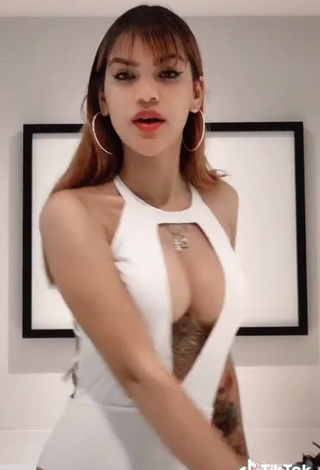 3. Hot Melissa Rodriguez Shows Cleavage in White Swimsuit