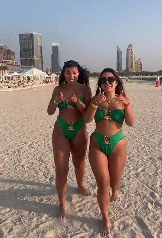 1. Hot Nourhène Shows Cleavage in Green Bikini at the Beach