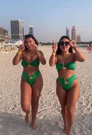 Hot Nourhène Shows Cleavage in Green Bikini at the Beach