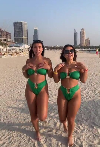 3. Hot Nourhène Shows Cleavage in Green Bikini at the Beach