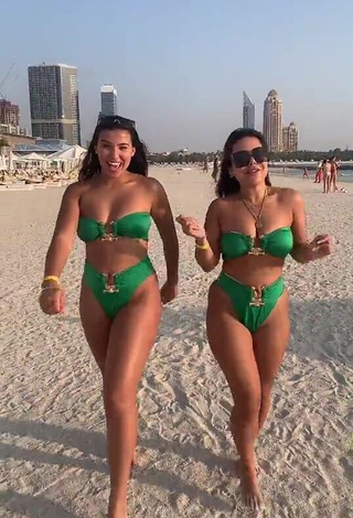 4. Hot Nourhène Shows Cleavage in Green Bikini at the Beach