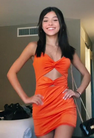 1. Sexy Rachel Brockman in Orange Dress