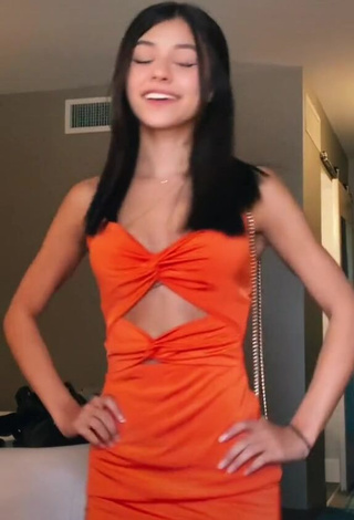 3. Sexy Rachel Brockman in Orange Dress