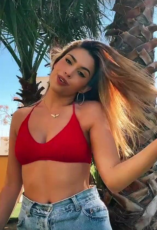 1. Sexy Victoria Caro Shows Cleavage in Red Bikini Top