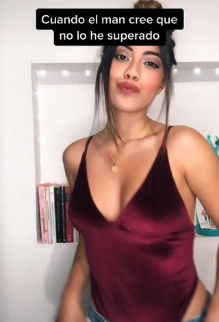 Hot Aleja Villeta Shows Cleavage in Red Bodysuit