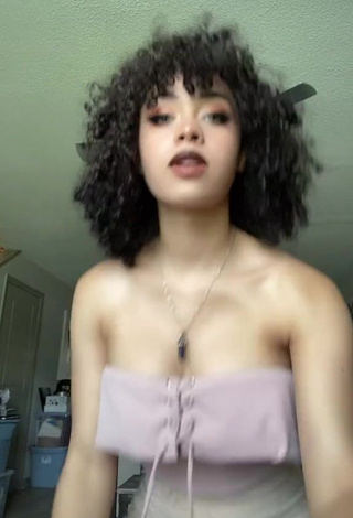 1. Hot Arielle Tara Shows Cleavage in Pink Top