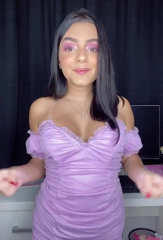 1. Hot Bela Almada Shows Cleavage in Purple Dress