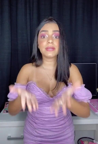 Hot Bela Almada Shows Cleavage in Purple Dress