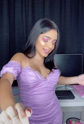 3. Hot Bela Almada Shows Cleavage in Purple Dress