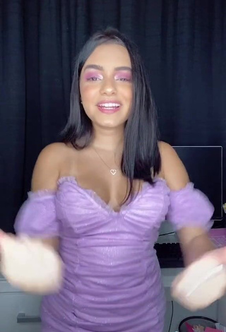 4. Hot Bela Almada Shows Cleavage in Purple Dress