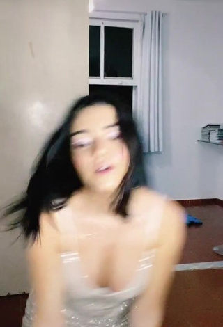 3. Desirable Bela Almada Shows Cleavage in Dress and Bouncing Boobs