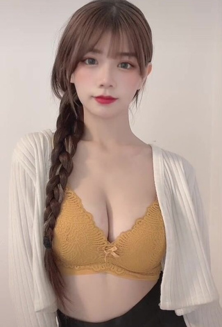 3. Hot c.0214 Shows Cleavage in Yellow Bra