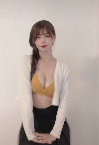 4. Sexy c.0214 Shows Cleavage in Yellow Bra