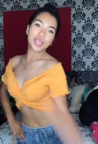 Cute Dayana Shows Cleavage in Orange Crop Top