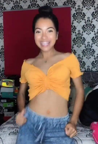 4. Cute Dayana Shows Cleavage in Orange Crop Top