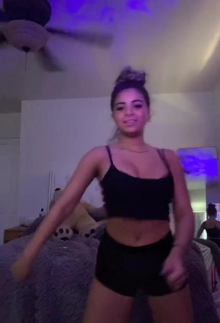 Cute Devenity Perkins Shows Cleavage in Black Crop Top while Twerking